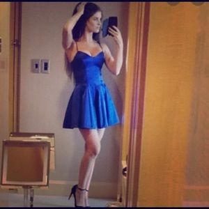 Beautiful unworn Bebe sweetheart satin dress